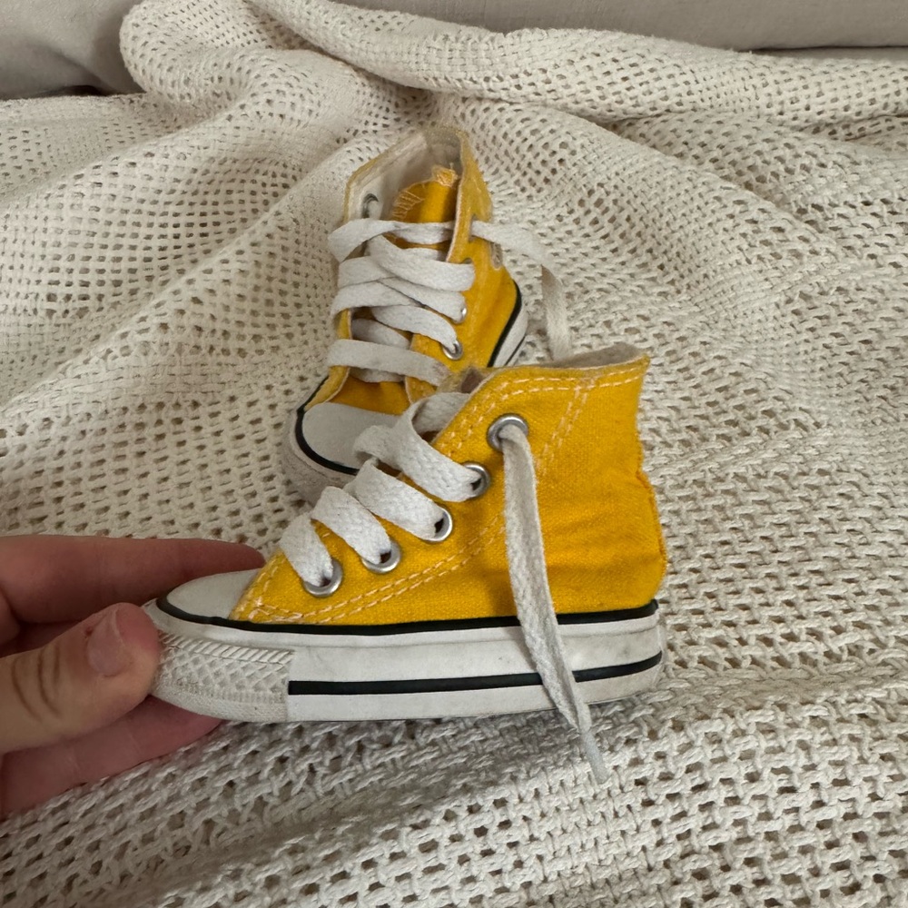 Yellow converse shoes
